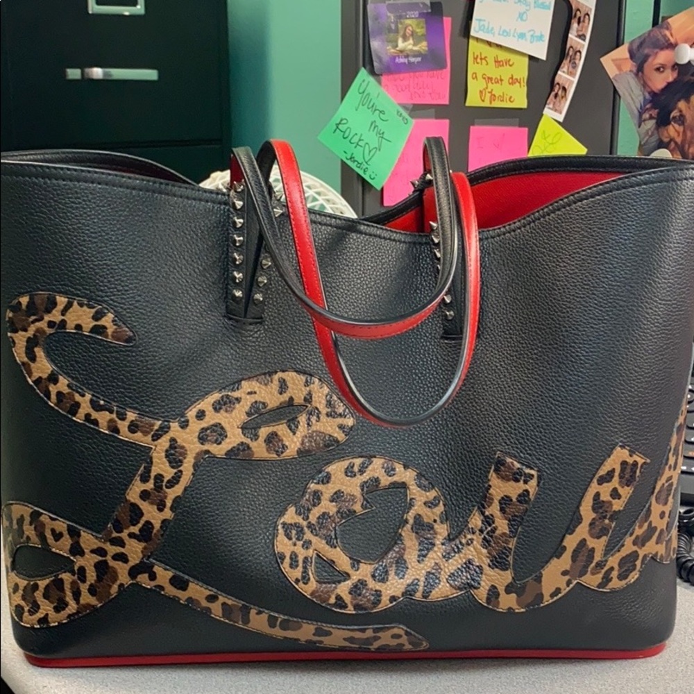 Louboutin purse looks brand new